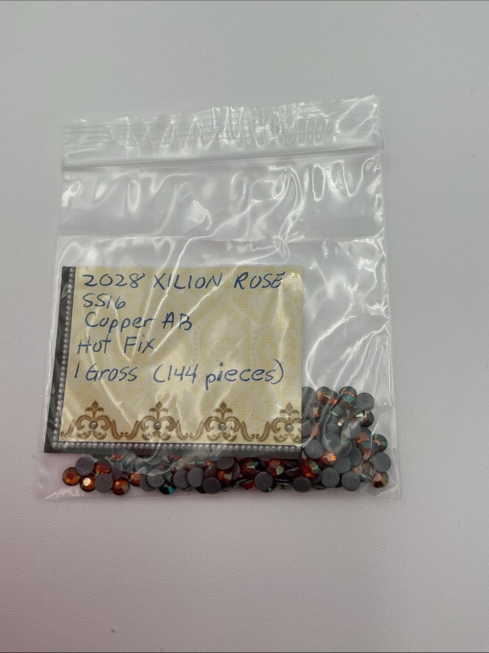 Swarovski • Color: Copper Aurora Borealis, 2028 XILION Rose Hotfix Rhinestones